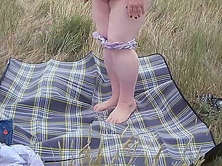 Bitch Masturbates Pussy With a Toy in the Field