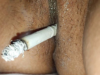 Rajasthani  Neha  Pussy of the Smokes cigarette and gets  fingers inserted in her pussy