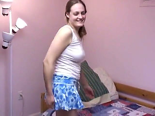 Amateur girl spreads and treats her shaved pussy to a vibrating session