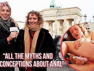 A hot blonde fingers her friend's ass after a street interview turns lesbian